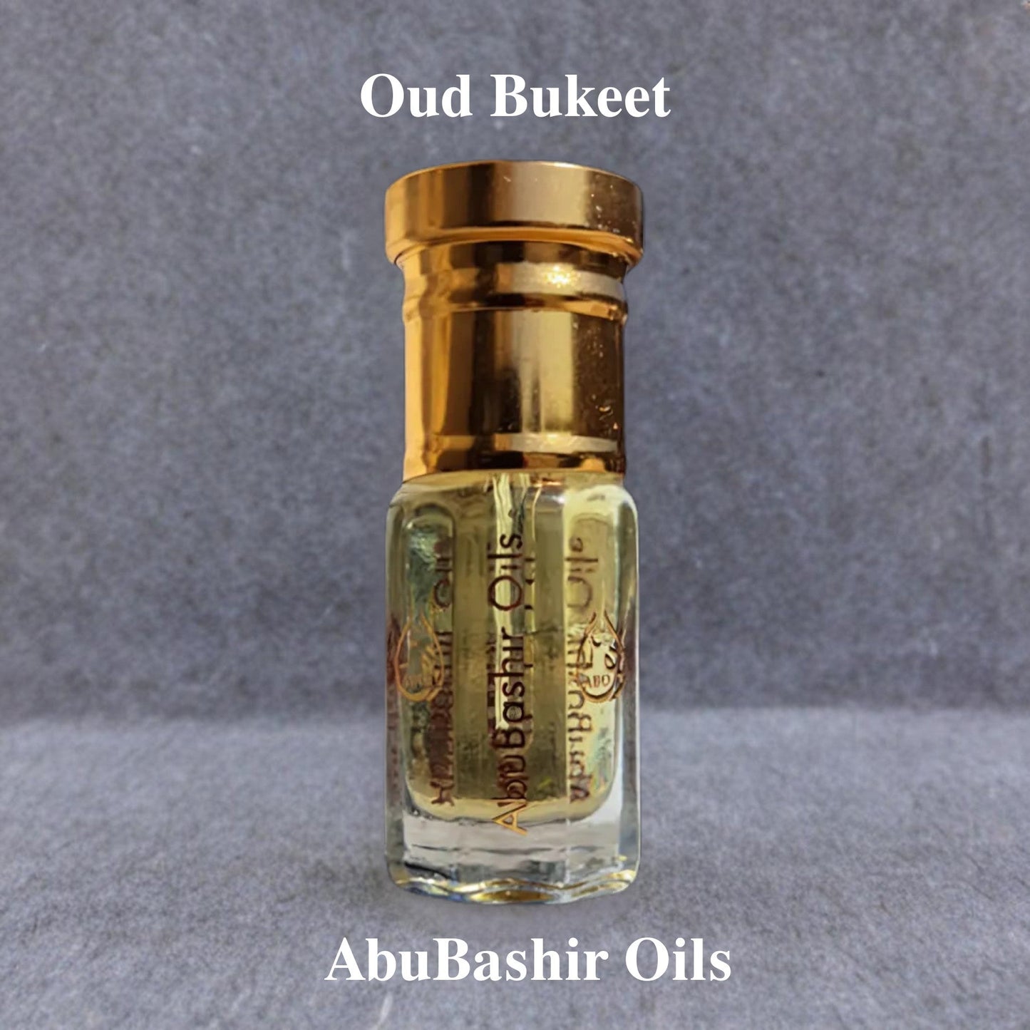 Small glass bottle of Oud Bukeet oriental fragrance oil with golden cap by AbuBashir Oils