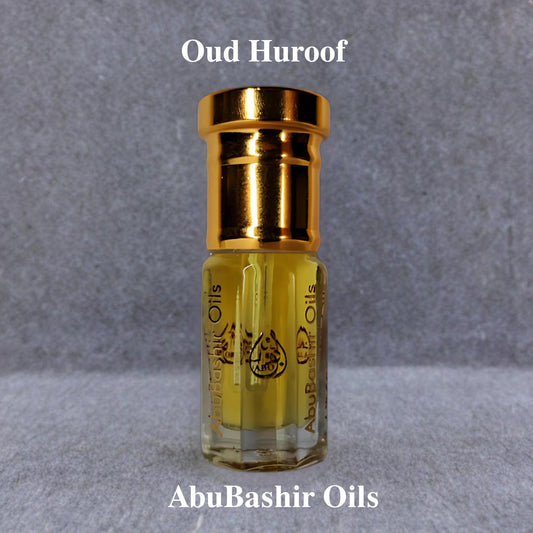 Oud Huroof fragrance oil by AbuBashir Oils with rich oud, amber, and citrus notes in a compact bottle