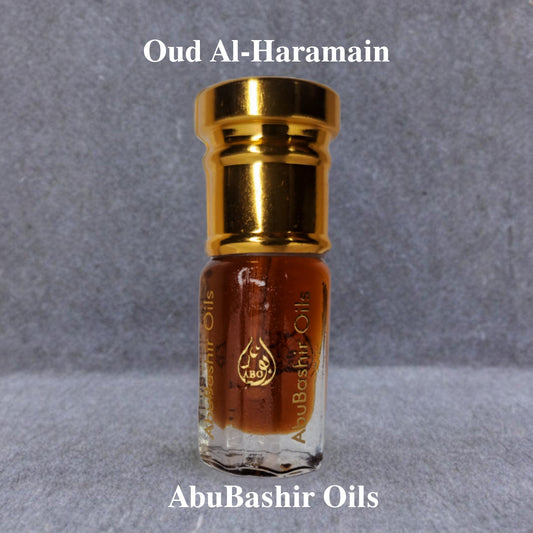 Oud Al-Haramain luxury amber and citrus fragrance by AbuBashir Oils in a small glass bottle with gold cap