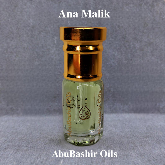 Ana Malik luxury perfume oil by AbuBashir Oils with bergamot, lavender, cedar, and musk notes in a small glass bottle with gold cap